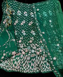 Dark Green color heavy embroidery with sequined work multiflared very heavy lehn&hellip;