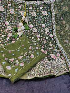 Olive green color heavy embroidery with sequined work multiflared very heavy leh&hellip;