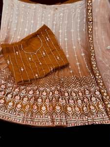 Party Wear Lehnga: Ombré shades Netting based embroidery work multiflared beautiful lehnga with embroidery work design in blouse and embroidery dupatta (Unstitched Lehnga)