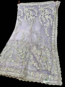 Heavy Work Sarees 1: (Video Clip attached )Lavender color designer Saree with netting base fabric and stones work design all over with heavy embroidery work