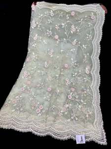 Heavy Work Sarees 1: (Video Clip attached )Pastel Mint color Heavy work designer Saree with netting base fabric and stones work design all over with heavy embroidery work