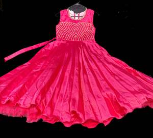 Hot pink colour silk based stone work beautiful gown