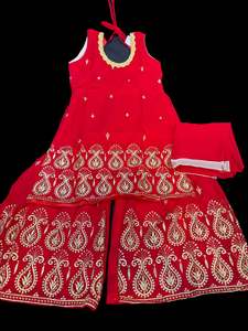 Red colour georgette based embroidered sharara suit