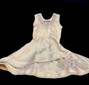Golden colour silk based beautiful kids gown