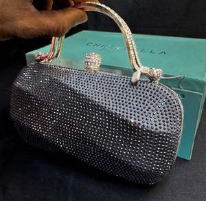 Clutch Bag And Potli Bag: Crystals Handwork designer hand bag with handle to carry with chain inside the clutch (can be attached or detached)