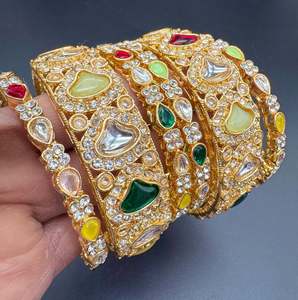 Kundan and multicolored stones work gold color bangles set (price per pack)