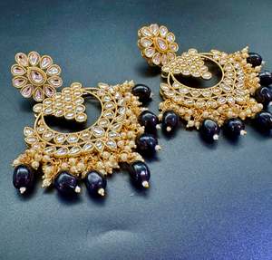 Earrings: Kundan with black pearls work design earrings