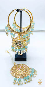 Earrings With Tikka: PAstel blue pearls work Jadau work Beautiful jhumka balian with tikka set