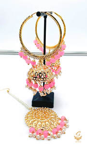 Earrings With Tikka: Bubblegum Pink pearls work Jadau work Beautiful jhumka balian with tikka set