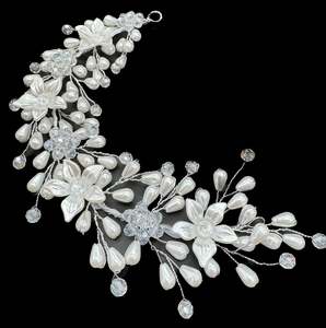 Very shiny and sparkly white crystals with pearls hair accessories for engagement bride