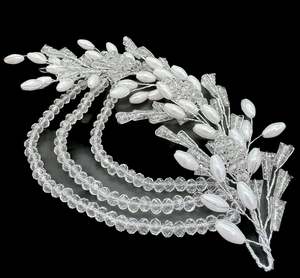 Very shiny and sparkly white crystals with pearls hair accessories for engagement bride
