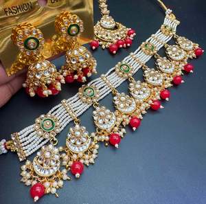 Choker Necklace: Red Beautiful Kundan and pearls work classy choker set with beautiful earrings & Tikka