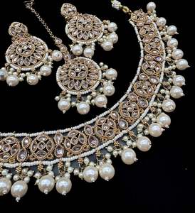 Heavy Work Necklace Sets 1: Original Polki stone with pearls beaded heavy work classy necklace with earrings and tikka set