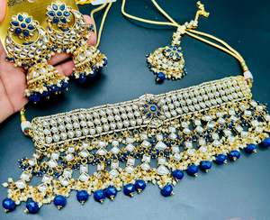 Kundan with pearls work beautiful heavy work necklace with designer Jhumka Earri&hellip;