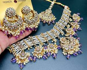 Kundan with pearls work beautiful heavy work necklace with designer Jhumka Earri&hellip;