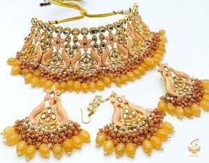 peach colour Beautiful meenakari work with peach yellow pearls with Kundan Stone&hellip;