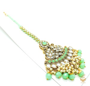 Maang Tikka And Matha Patti: Pastel mint Pearls with kundan stone beautiful tikka