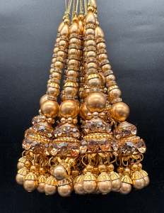 Latkans: Beautiful lite golden design medium size lehnga latkans tessels (pair)