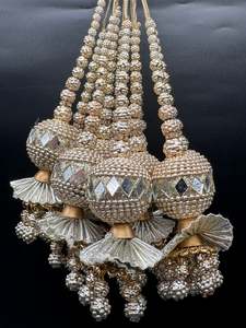 Latkans: Beautiful lite golden design medium size lehnga latkans tessels (pair)