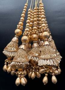 Latkans: Beautiful golden design medium size lehnga latkans tessels (pair)