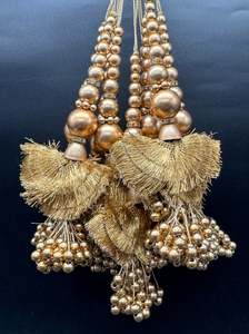 Latkans: Beautiful golden design medium size lehnga latkans tessels (pair)