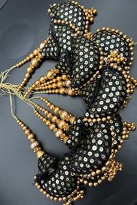 Beautiful cushioned design medium size lehnga latkans tessels (pair)