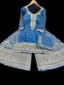 Sharara Lehnga Suits 1: (Video clip attached) Pecaock Blue color shiny soft silk based heavy embroidery work kameez with heavy embroidery work sharara pants and soft silk dupatta with embroidery border