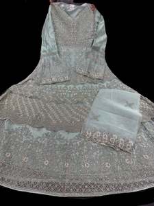 Womens: Pastel Aqua color netting based golden stones and embroidery work all over front & back of kameez with stone work and beautiful lehnga with jacket & netting dupatta (Size 42 and can be altered upto 44)