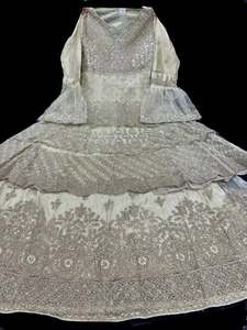 Womens: Pastel Mint color netting based golden stones and embroidery work all over front & back of kameez with stone work and beautiful lehnga with jacket & netting dupatta (Size 42 and can be altered upto 44)