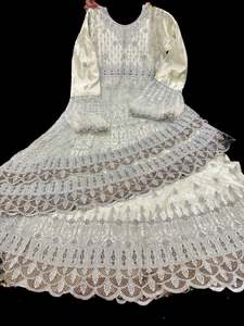 Womens: Netting based silver stones and embroidery work all over front & back of kameez with stone work and beautiful lehnga & netting dupatta (Size 44 and can be altered upto 46)