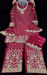 Womens: Cherry color Netting based Golden stones and embroidery work all over front & back of kameez with stone work and beautiful plazo pants with Long heavy work jacket& netting dupatta (Size 42 and can be altered upto 44)