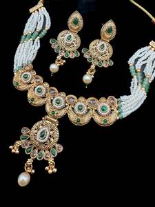 Mat look antique gold traditional necklace with pearls and Polki work & earrings