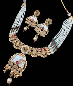 Jewellery: Mat look antique gold traditional necklace with pearls and kundan work & earrings