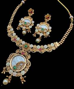 Jewellery: Mat look antique gold traditional necklace with pearls and kundan work & earrings