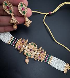 Jewellery: Mat look antique gold traditional necklace set with pearls and kundan work
