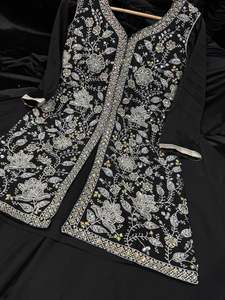 Womens: (Video clip attached) Black color georgette based heavy hand work pearl beaded work with big flared plazo and georgette dupatta (size 38 and can be altered upto 40)