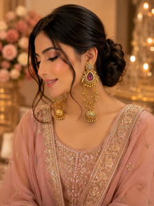 Jewellery: Elegant Kashmiri long jhumka earrings with royal ruby stones and intricate ghungroo detailing for a timeless festive look ✨
(slight variation in color and design is possible )