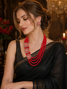 Elegant long beaded necklace set featuring multiple layers of vibrant red beads,&hellip;