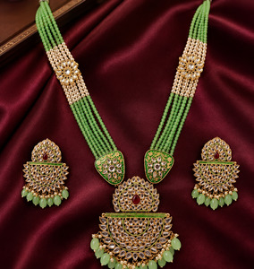 Jewellery: Kundan & meenakari work elegant long pendant necklace set with pearl detailing and matching earrings — perfect for festive, wedding & traditional looks (slight variation in color and Design is possible )