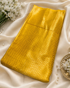 Fabrics: Yellow brocade silk Fabric (price per meter) perfect for stitching blouses /skirts /suits (aprox 112cm width )slight variation in color may occur