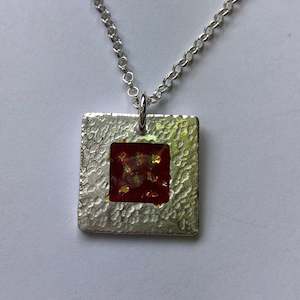 Pendant: pendant, hammered fine silver with red enamel and fine gold detail