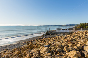 Products: Limestone rock erosion protection on the beach at Haumoana / Te Awanga, Hastings, Hawke’s Bay, New Zealand - SCP Stock