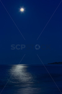 Moon rising over Cape Kidnappers, Te Awanga, Hawke's Bay, New Zealand - SCP Stock