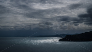 Products: The view towards Whakaki Beach on a stormy day from Mokotahi lookout, Mahia Peninsula, Hawke's Bay, New Zealand - SCP Stock