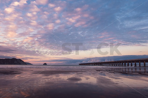 Tolaga Bay (Uawa) Wharf at sunset, Tolaga Bay, Eastland, Gisborne, New Zealand - SCP Stock