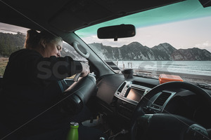 Stopping for a cuppa at the beach during an NZ staycation, New Zealand - SCP Stock