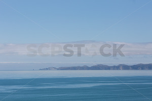 Products: Aerial view looking over Hawke Bay towards Cape Kidnappers from Napier, Hawke's Bay, New Zealand - SCP Stock