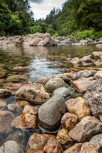 Products: Boulders in the Ohinemuri River, Karangahake Gorge - SCP Stock