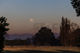 Super blue full moon setting over the Kaweka Ranges, Hastings, Hawke's Bay - SCP Stock %