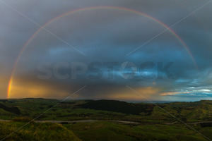 Products: A rainbow over the Tukituki valley, Hawke's Bay, New Zealand - SCP Stock